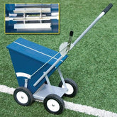A blue wheelbarrow equipped with a handle, ideal for carrying soil, plants, or tools in outdoor settings.